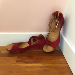 Red heeled shoes with straps